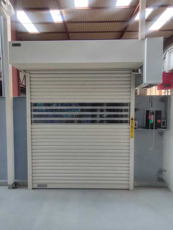 Double Wall rolling shutter with vision panel.